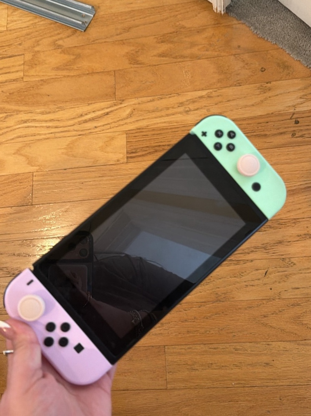Nintendo Switch Console with Purple & Mint Joy-Con Controllers
